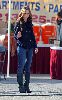 Jennifer Love Hewitt : wearing a navy jacket and tight jeans with a matching black boots at the filming set