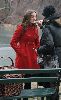 Leighton Meester : filming a scene for her tv show Gossip Girl in Central Park wearing a red double-chest coat and red shoes