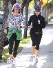 Reese Witherspoon running at the street with her personal trainer on Jan 6th 2009