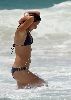 Ana Ivanovic : spotted swimming at the beach in Australia where she is vacationing wearing a black bikini