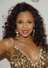 Ashanti : stylish look with her curly hair and golden dress at the Ultimate Prom on the 30th of May 2008