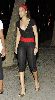 Rihanna : spotted lower Manhattan wearing a black v-neck top and gold high heels with a ponytail hairstyle tied in a red bandana