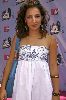 Vanessa Lengies ina silver and white dress