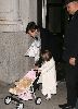 Suri Cruise together with her bunny-baby