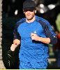 Jake Gyllenhaal running with his his personal trainer on Wednesday in Santa Monica, California 14th of January 2009