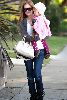 Isla Fisher seen with her baby girl Olive