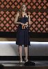 Amy Adams onstage presenting a Critics Choice Award