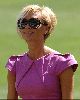 Victoria Beckham : lovely pink dress matched with dark sunglasses and the short bleached hair