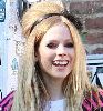 Avril Lavigne standing outside the Viper Room nightclub