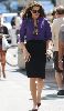 Brooke Shields : wearing a purple satin shirt and a black skirt on the set of the TV series Lipstick Jungle in New York on the 16th of July 2008