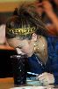 Miley Cyrus driking directly from a coke glass in a restaurant using her nose!