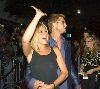 Brad Pitt and Jennifer Aniston wearing a see through black top