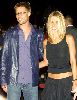 Brad Pitt and Jennifer Aniston wearing a see through black top