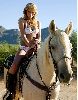 Brooklyn Decker riding a horse