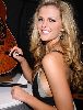 Brooklyn Decker signing a guitar