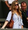 Brooklyn Decker watching a tennis match