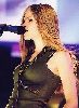 avril lavigne singing live on stage in a concert