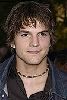 Ashton Kutcher wearing a necklace