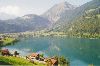 Cities Europe Switzerland : The Swiss town of Lungern on the Lungernsee, with Mount Giswil above