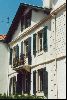 Cities Europe France : This is Basque architecture - white buildings with shutters coloured red, gre