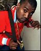 Kanye west in a red blouse