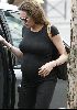 Angelina Jolie pregnant photo wearing a black tshirt and pants