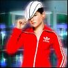 Music Jojo picture in a red Adidas jacket and a white cap