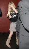 Avril Lavigne gray skirt and red nail polish